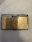 Vintage Folding Binoculars Opera Glasses Silver & Goldtoned Case Embossed Lenses. Fixed Price $125.00.