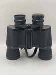 Tasco 7X35MM Binoculars 1000 Yards With Carrying Case & Strap Missing Eye Cover. Fixed Price $15.00.
