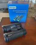 Adorrgon Powerful Binoculars, Magnification 12X, Objective Diameter: 42MM, Box. Fixed Price $14.00.