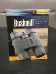 Bushnell Banner Binoculars Black Rubber Armor Vintage 2003 & Accessories 10X42. Fixed Price $54.99.