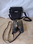 Bushnell Perma Focus Binoculars 10X42MM Optics Camouflage With Case. Fixed Price $19.99.
