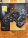Nikon Action Zoom 7-15X35 Binoculars Model 7227. Fixed Price $100.00.