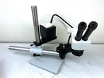 Leica EZ5 Stereozoom Microscope 10X-50X (10X Oculars) L2 Light & Boom Stand Read. Fixed Price $1299.92.