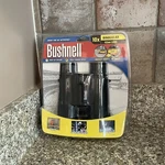 Bushnell Binoculars 10X 42MM Lens Model NO.21-0142C Brand New Sealed Package. Fixed Price $50.00.