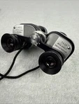 Vintage 7X23 Wide Angle Coated Optics Binoculars. Fixed Price $179.95.
