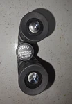 Bushnell 12X42 Binoculars 21-1224 Model 42MM Objective Lens Black. Fixed Price $25.00.