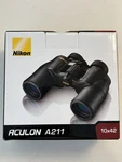 Nikon Aculon A211 10X42 Binoculars, Black, New Box. Fixed Price $80.00.
