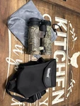 Bushnell Binoculars 10X42 Chuck Adams Excursion. Fixed Price $200.00.