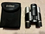 Bushnell Binoculars, Camera Image View 10X25 FOV300 1000 Yards 111025. Fixed Price $17.99.