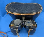 Tasco Model 214 Binoculars 7 X 50 Feather Weight 405 Ft 1000 Yds With Case. Fixed Price $15.40.